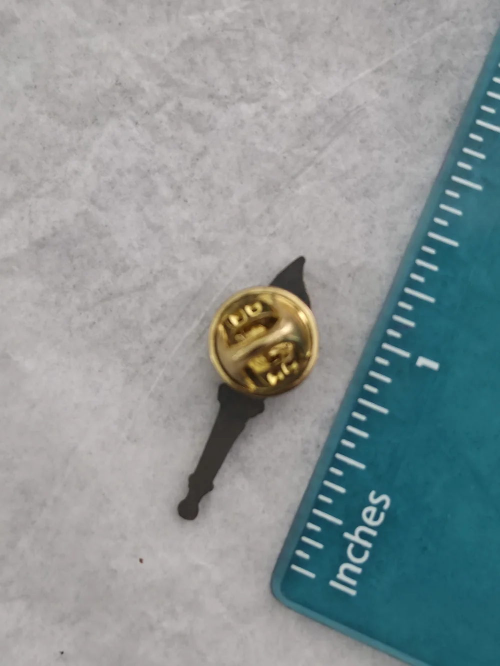 Antique-Inspired Torch Brooch in Gold Tone